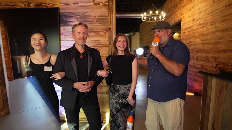 Event guests being interviewed by the event host